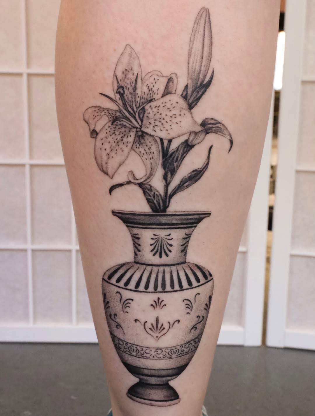 Tattoo by @laurence.t.l — black_and_grey, realism