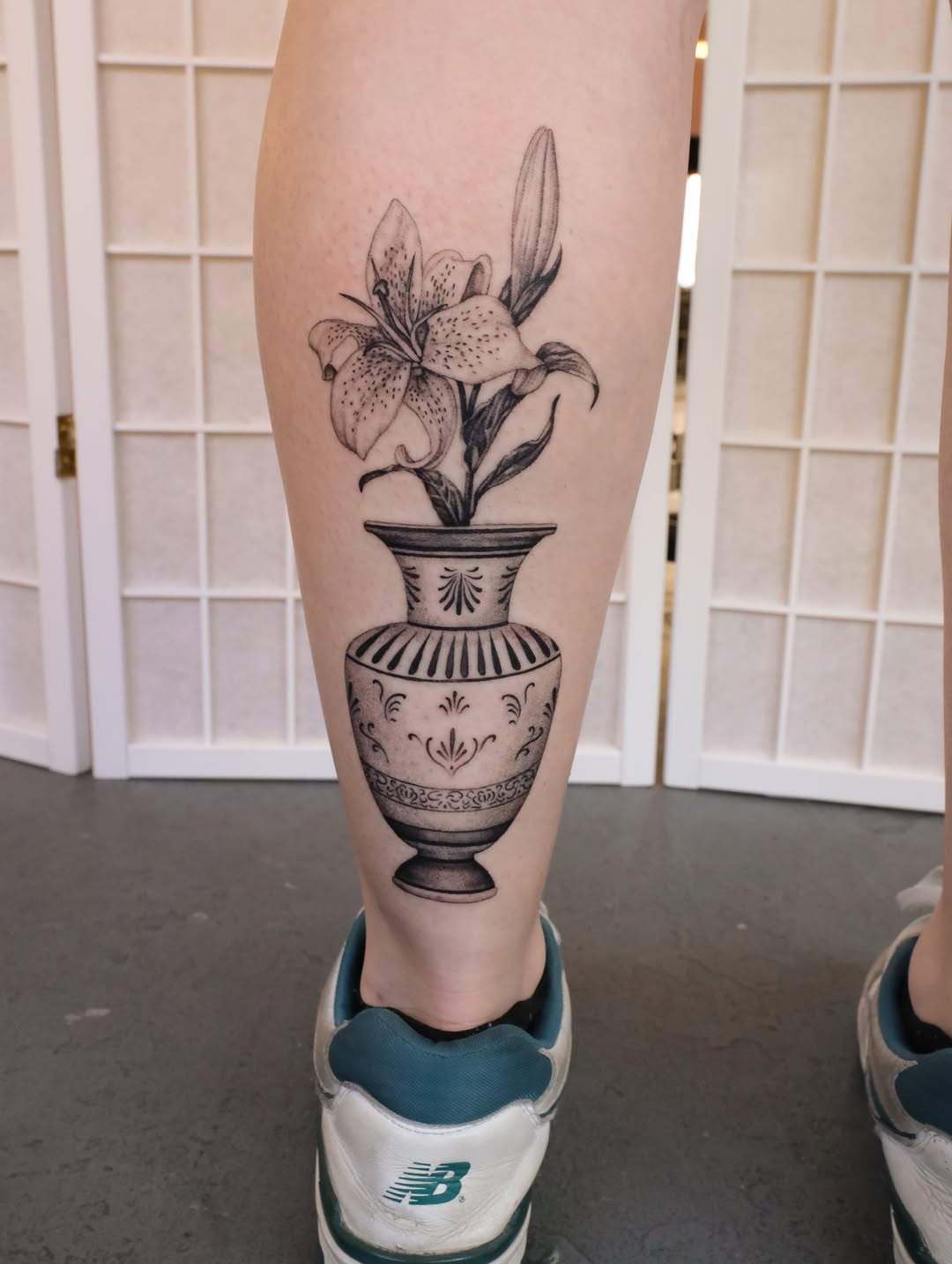 Tattoo by @laurence.t.l — black_and_grey, realism
