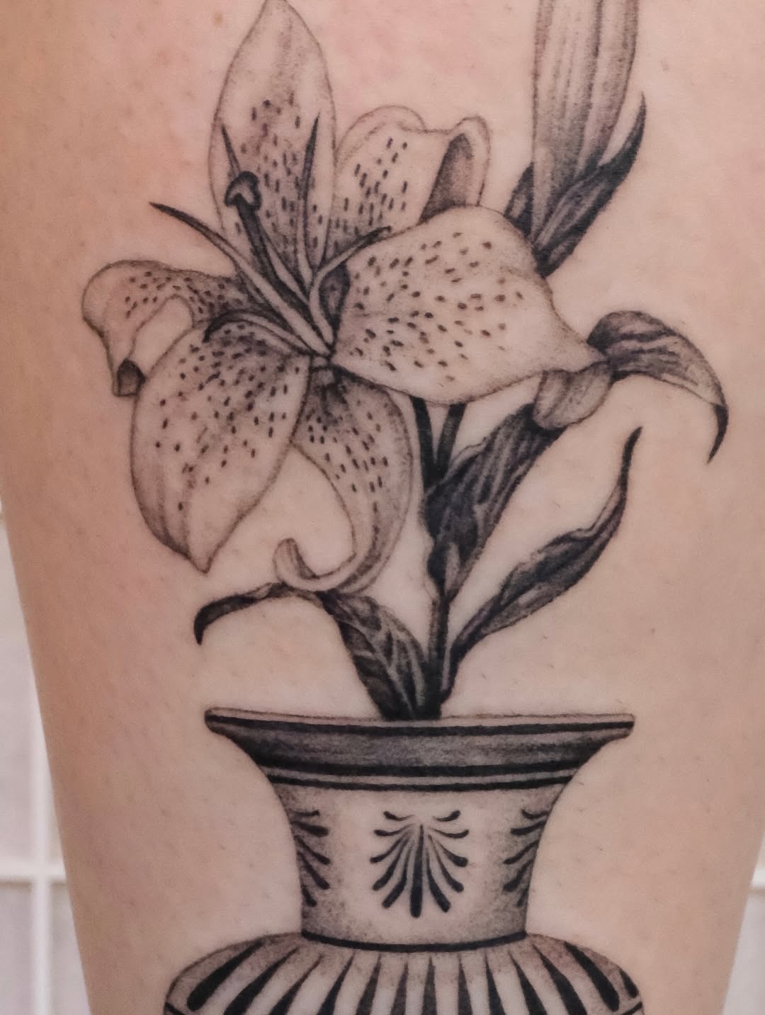 Tattoo by @laurence.t.l — black_and_grey, realism