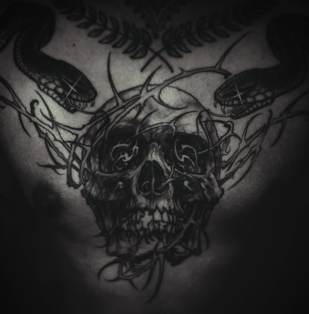 Tattoo by @lorenzotattoos — dark_realism, black_and_grey
