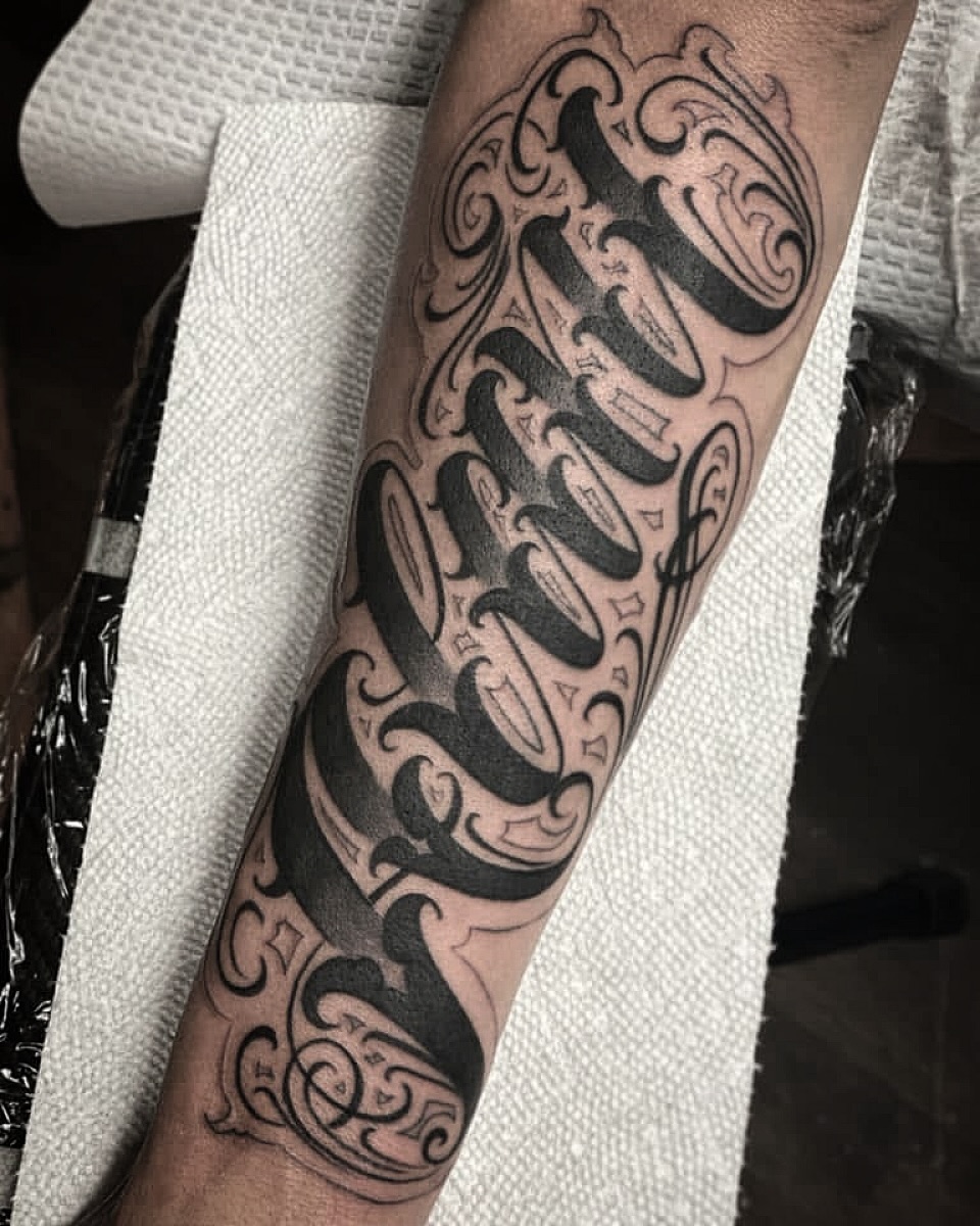 Tattoo by @lexmiranda — chicano, lettering_script