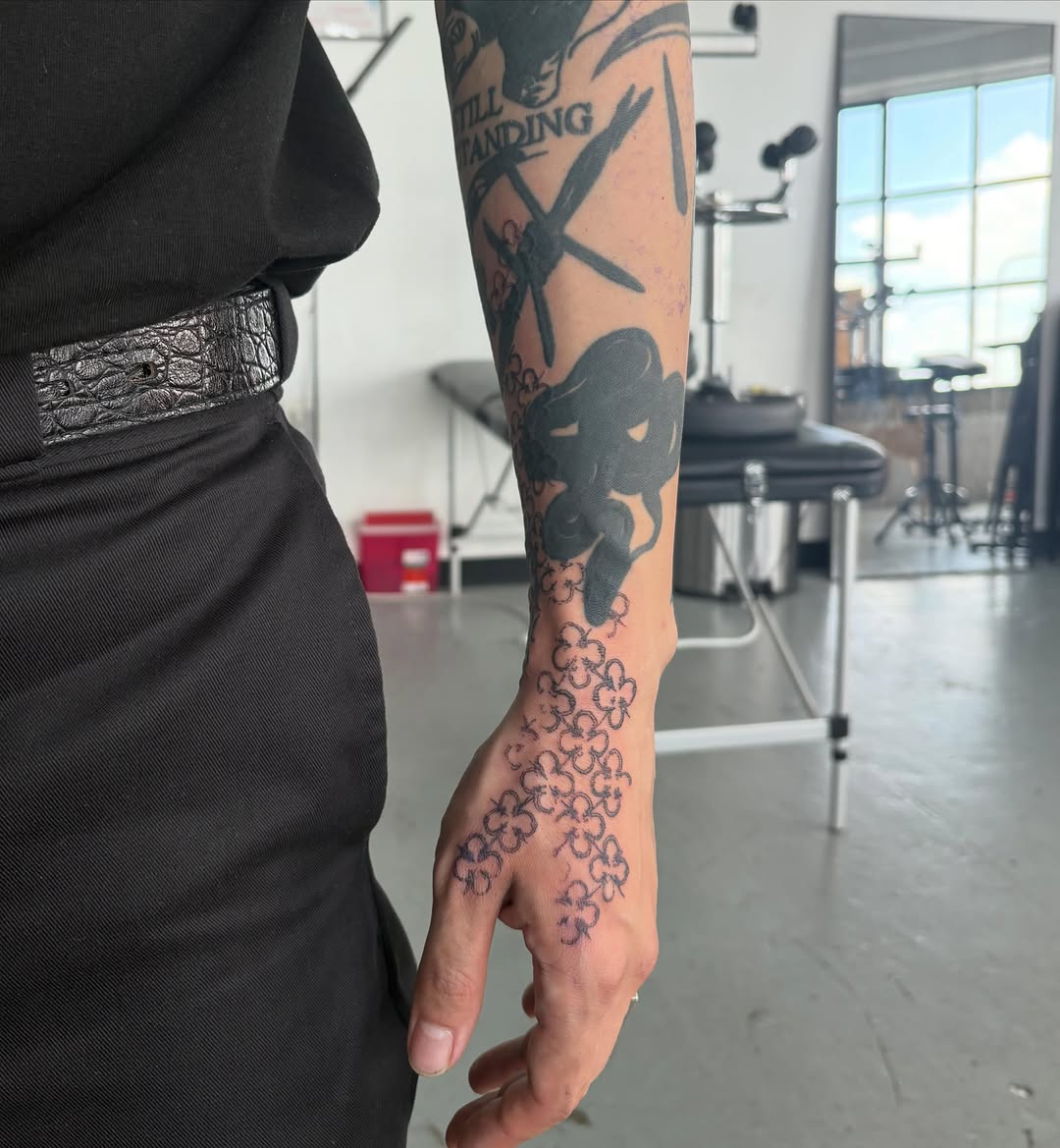 Tattoo by @spikecharms — illustrative, blackwork