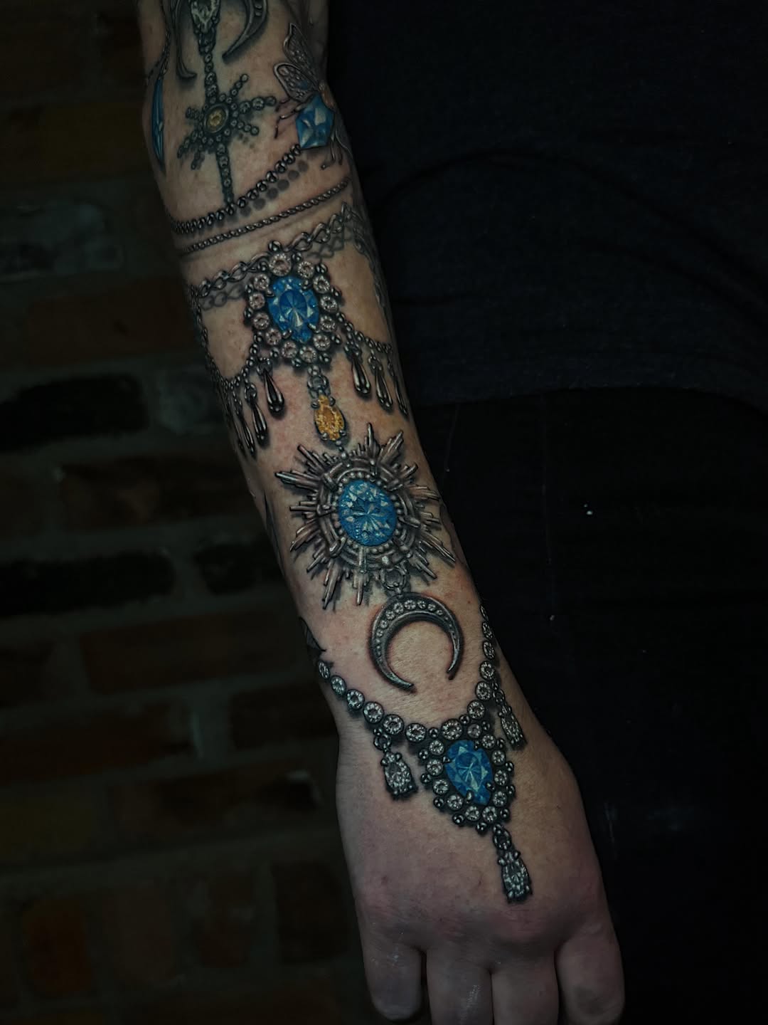 Tattoo by @amberstrangetattoos โ realism, black_and_grey