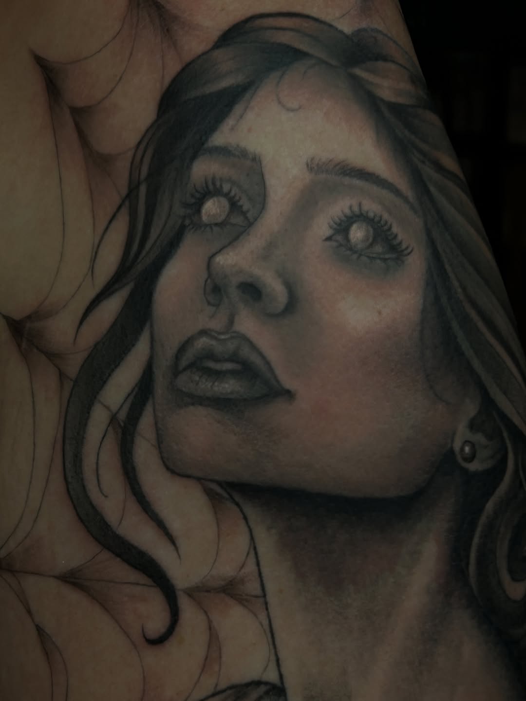 Tattoo by @eternalskye.art — realism, black_and_grey