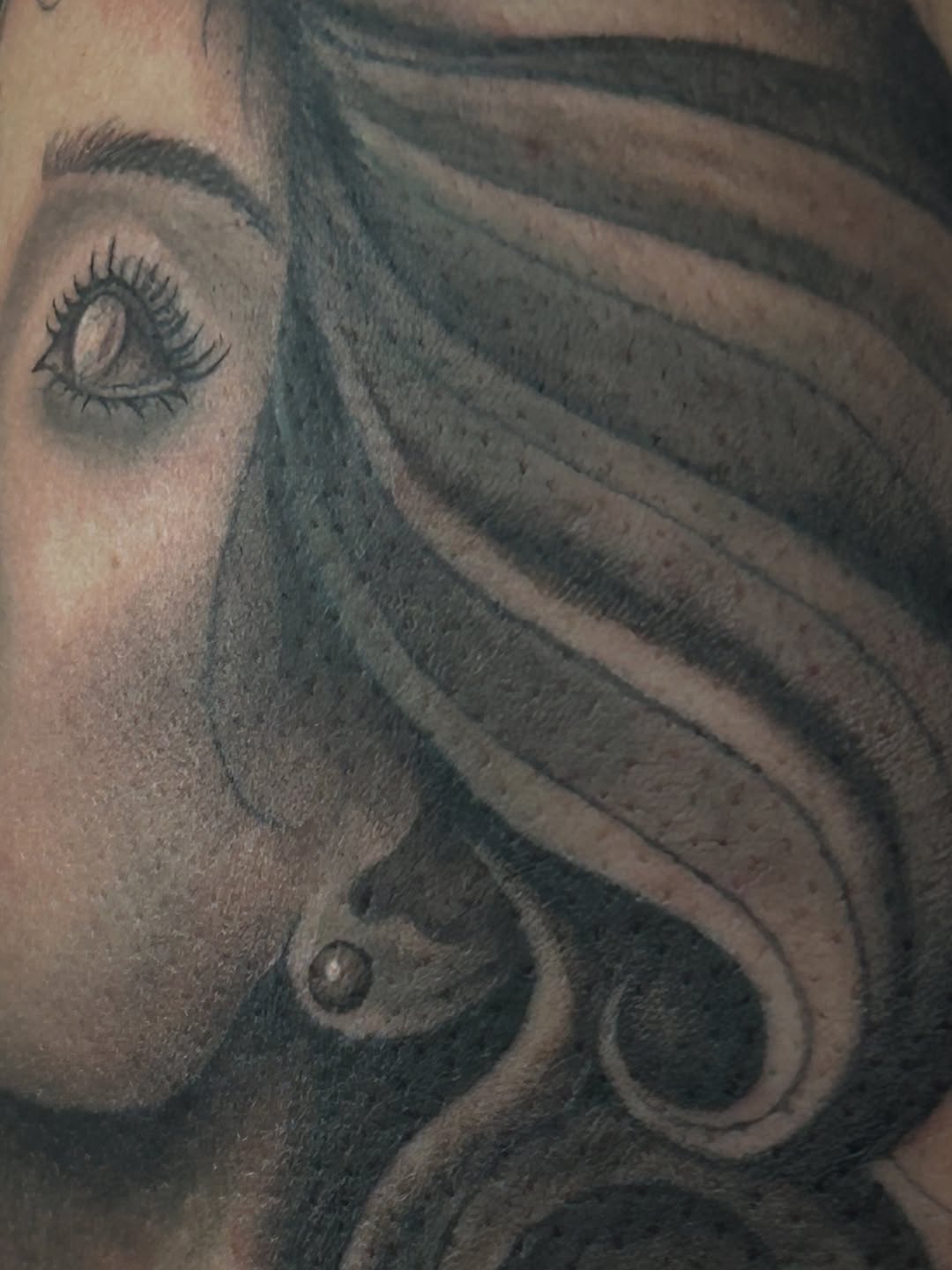 Tattoo by @eternalskye.art — realism, black_and_grey