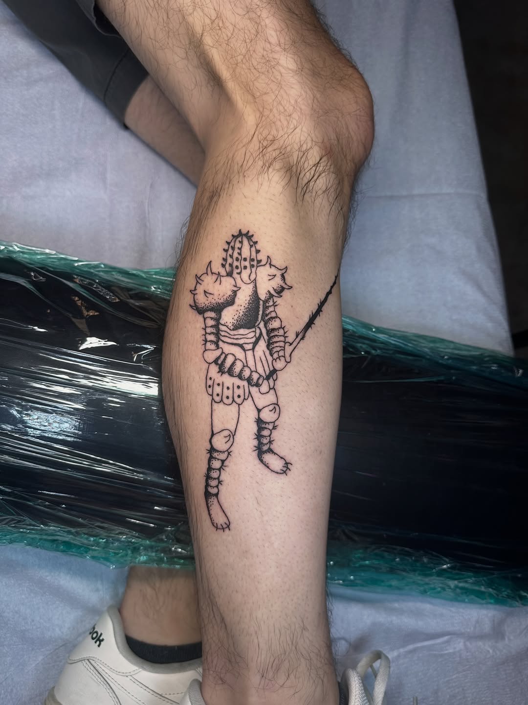 Tattoo by @thatguytattoos — illustrative, blackwork