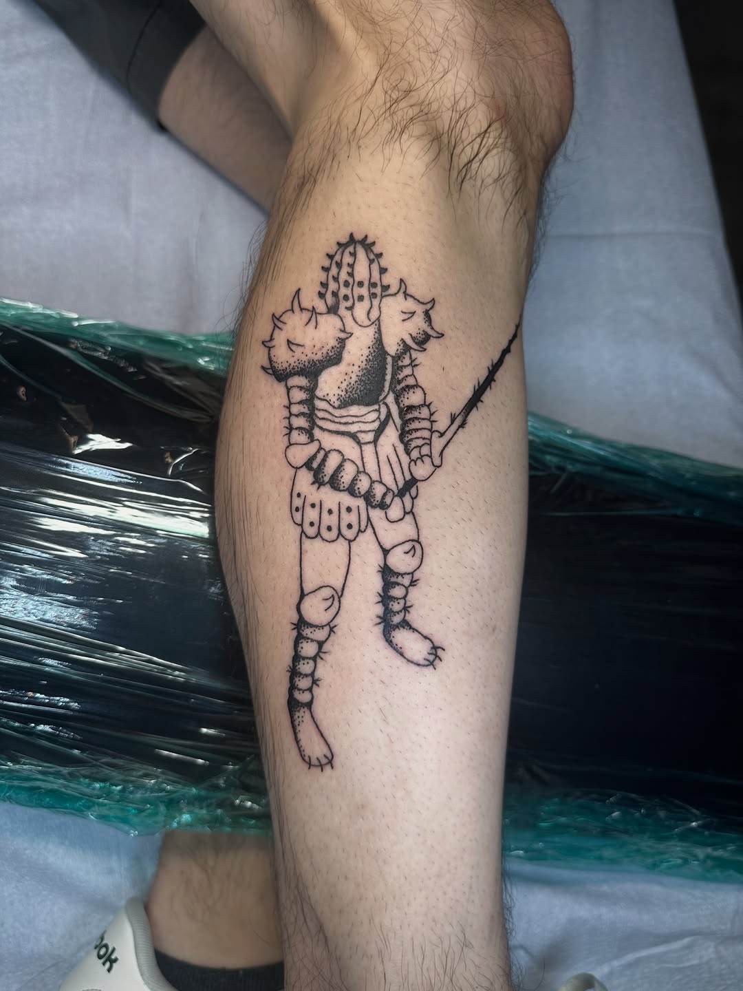 Tattoo by @thatguytattoos — illustrative, blackwork