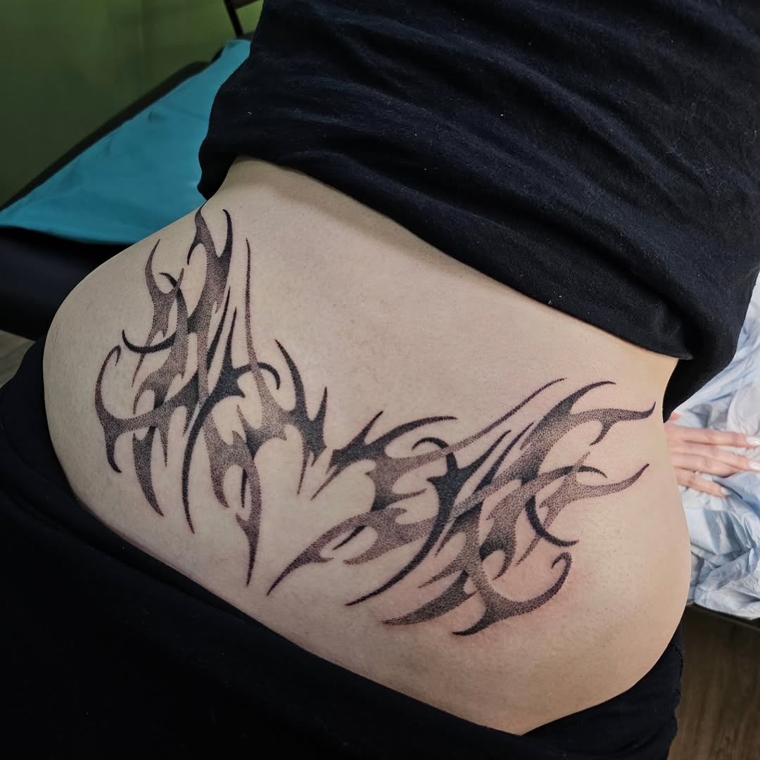 Tattoo by @zombiebellabug — tribal, dotwork