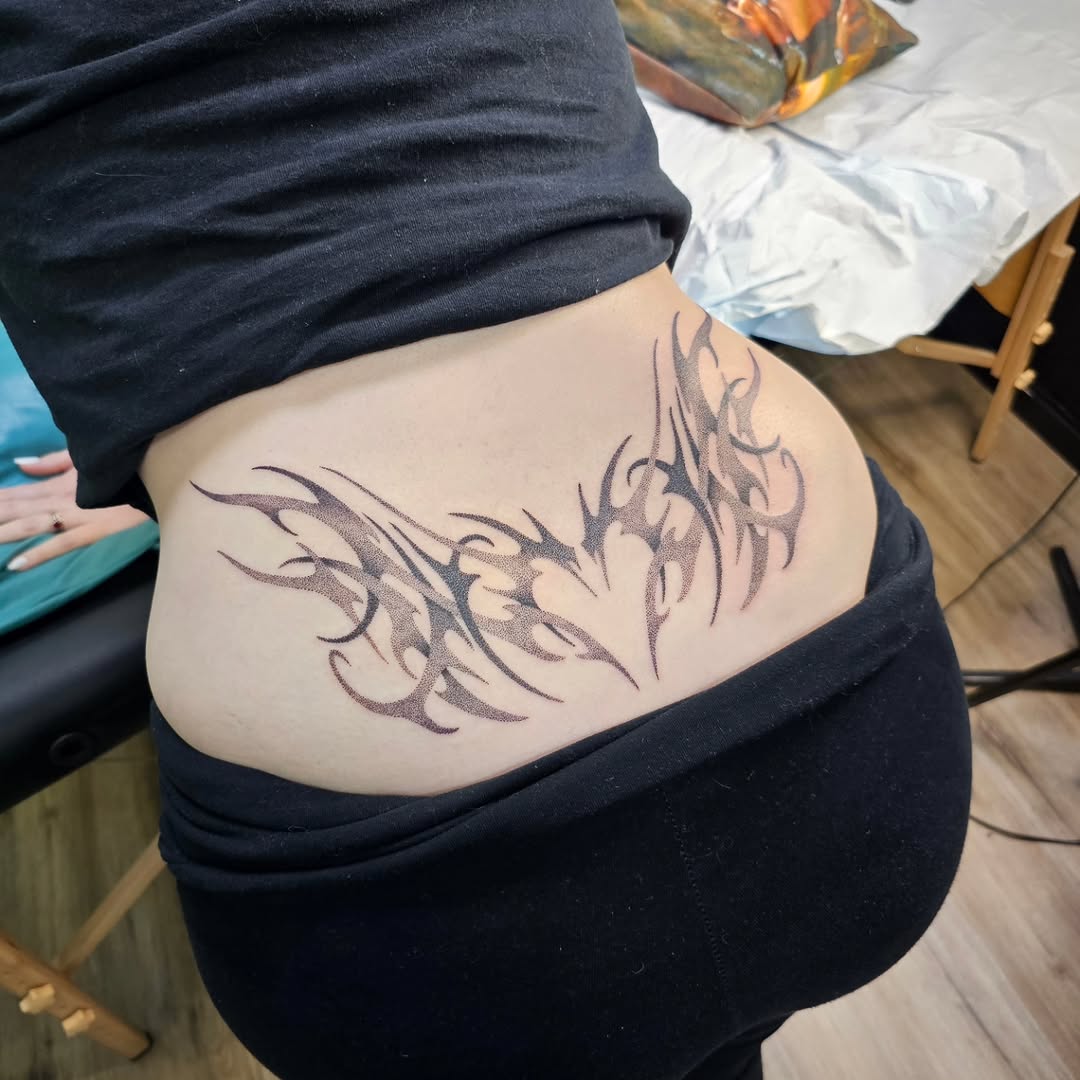 Tattoo by @zombiebellabug — tribal, dotwork