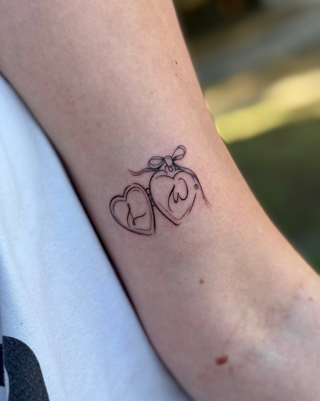 Tattoo by @velletta.tattoos โ fine_line, lettering_script