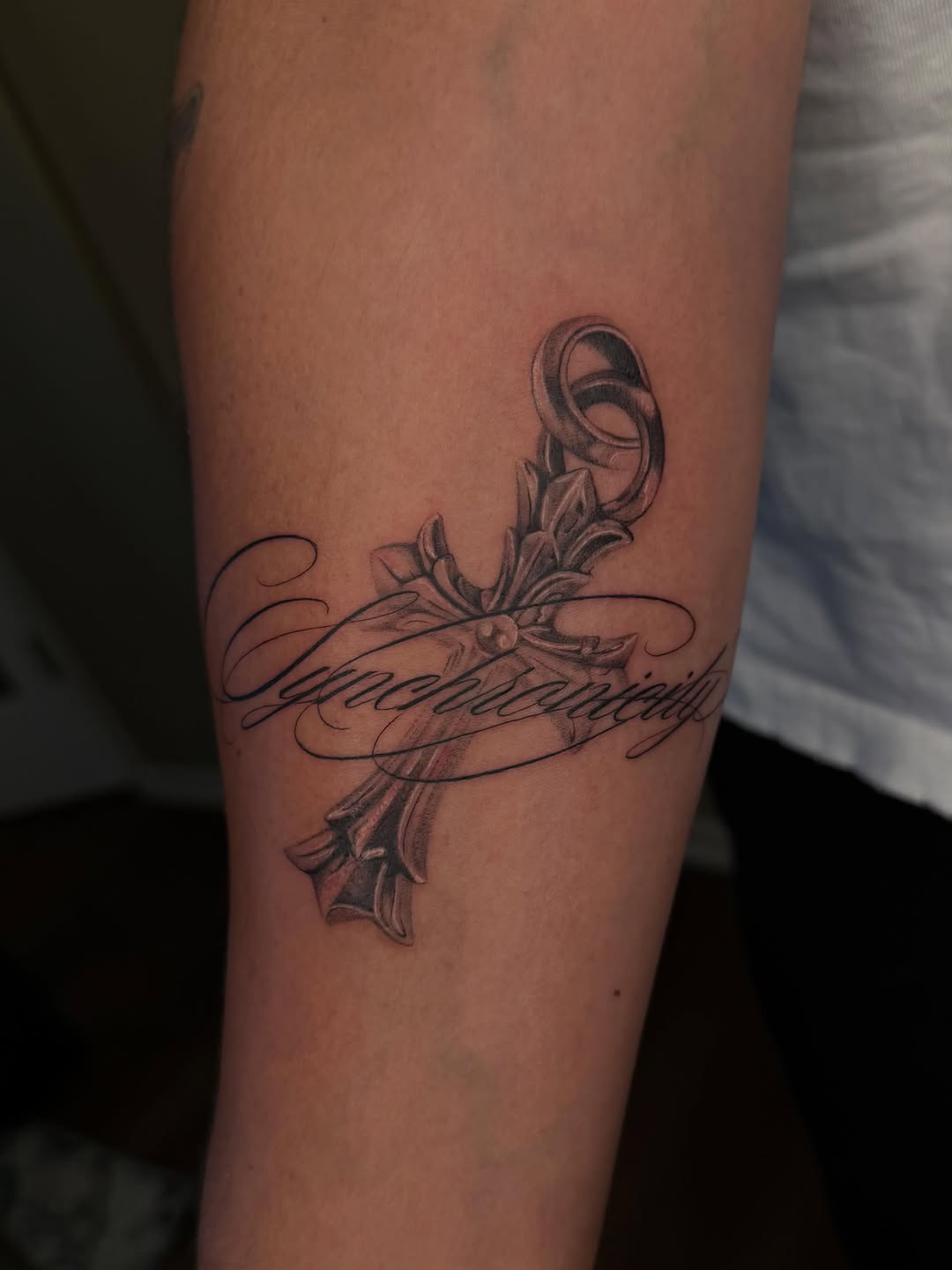 Tattoo by @midnight__mastermind — black_and_grey, lettering_script