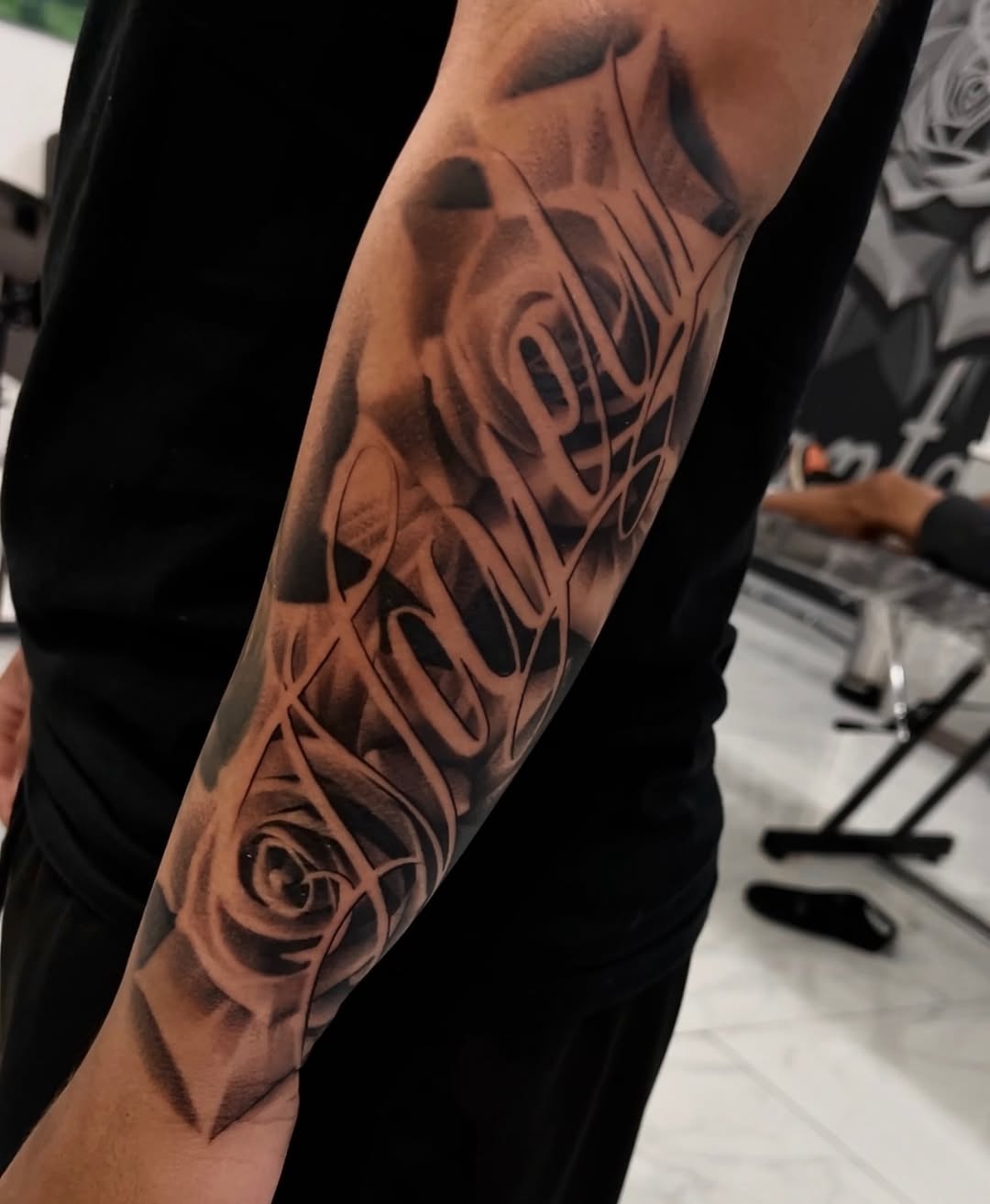 Tattoo by @alfredoadametattoo — lettering_script, black_and_grey