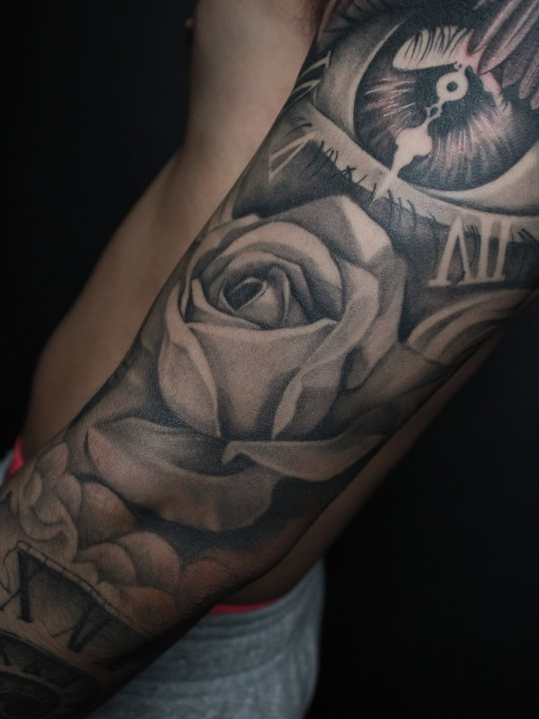 Tattoo by @withered_rose_tattoo โ realism, black_and_grey