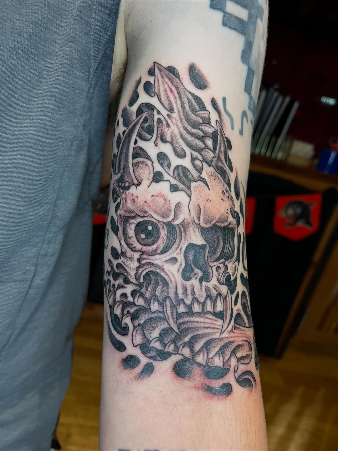 Tattoo by @graham_niles — black_and_grey, dark_realism