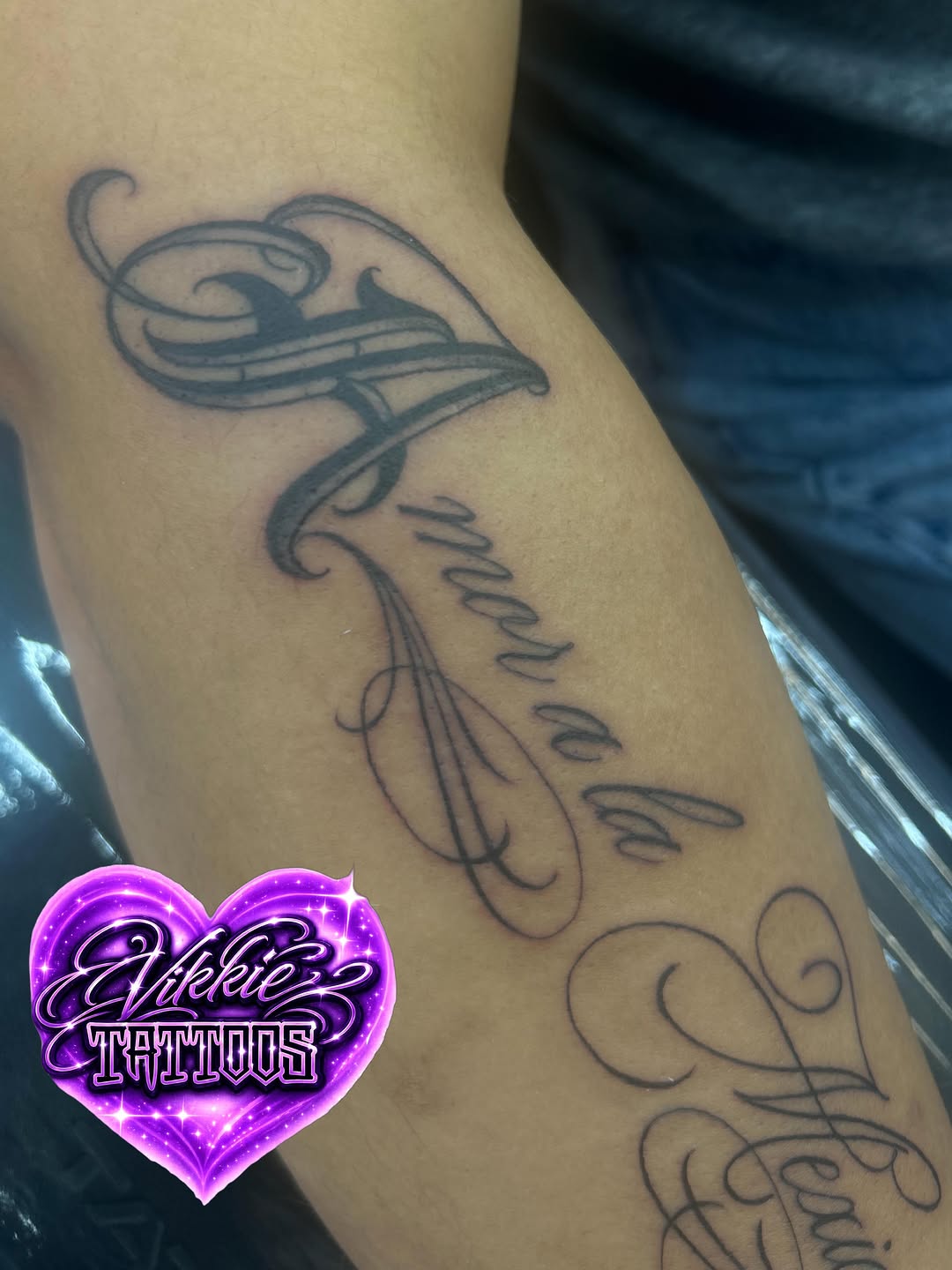 Tattoo by @vikkietattoos — lettering_script, ornamental