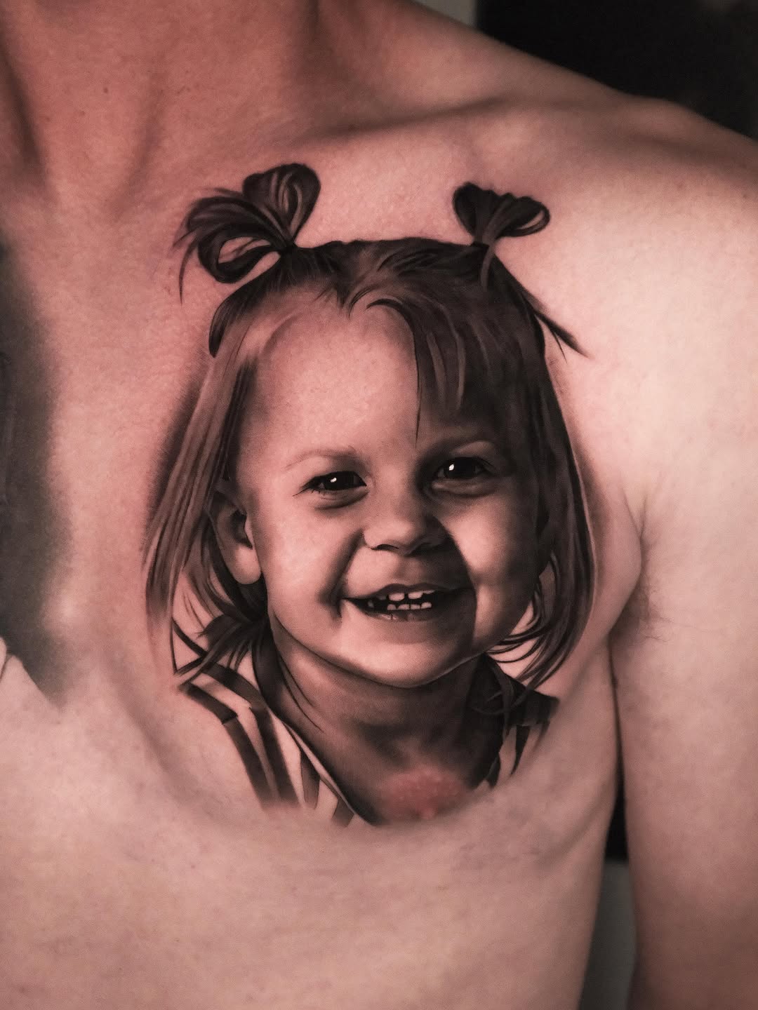 Tattoo by @tommylee.tattoo — realism, black_and_grey