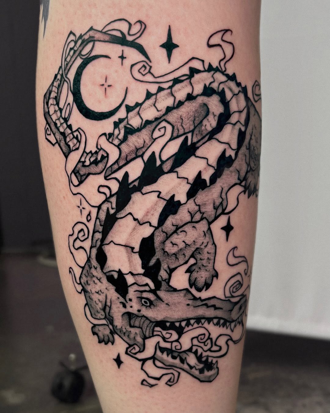 Tattoo by @unsaintlytattoo — black_and_grey