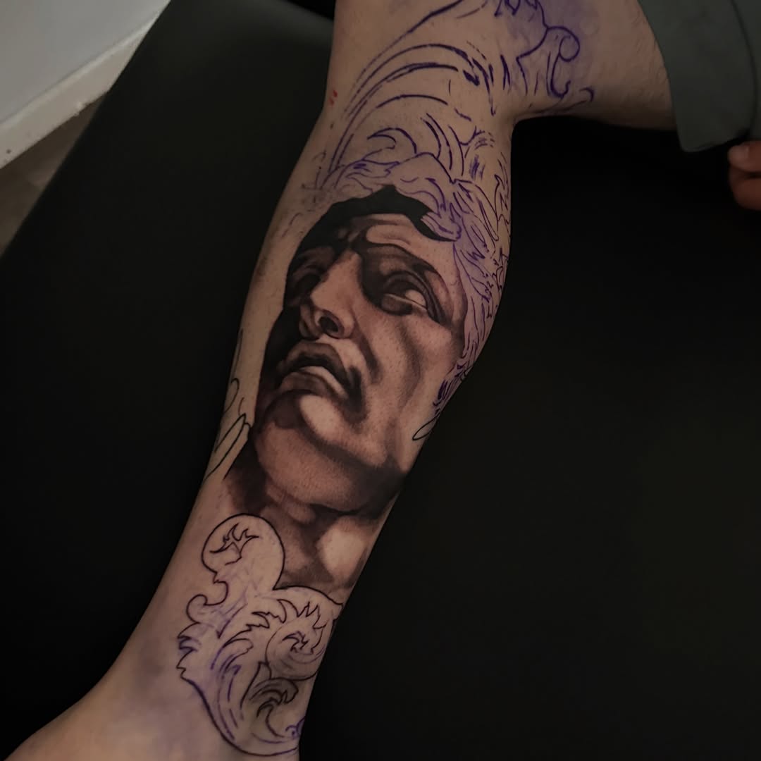 Tattoo by @tattooz_by_trent — realism, black_and_grey