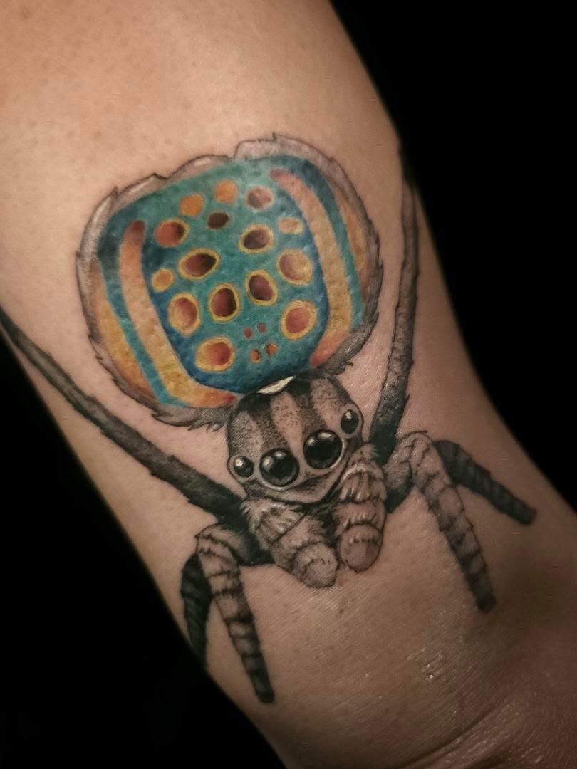 Tattoo by @swirly.boi — realism, illustrative
