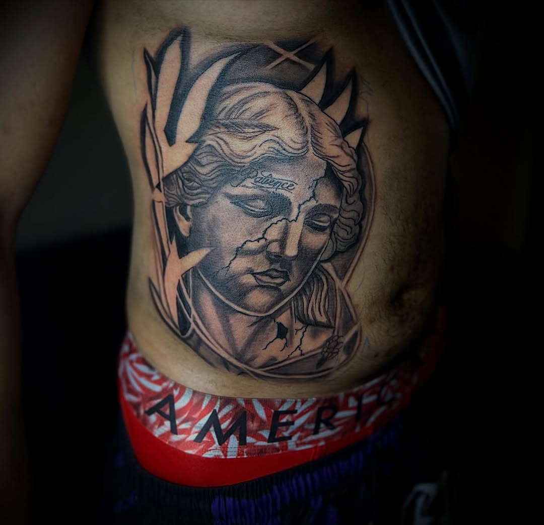 Tattoo by @tattsbyleek โ realism, black_and_grey