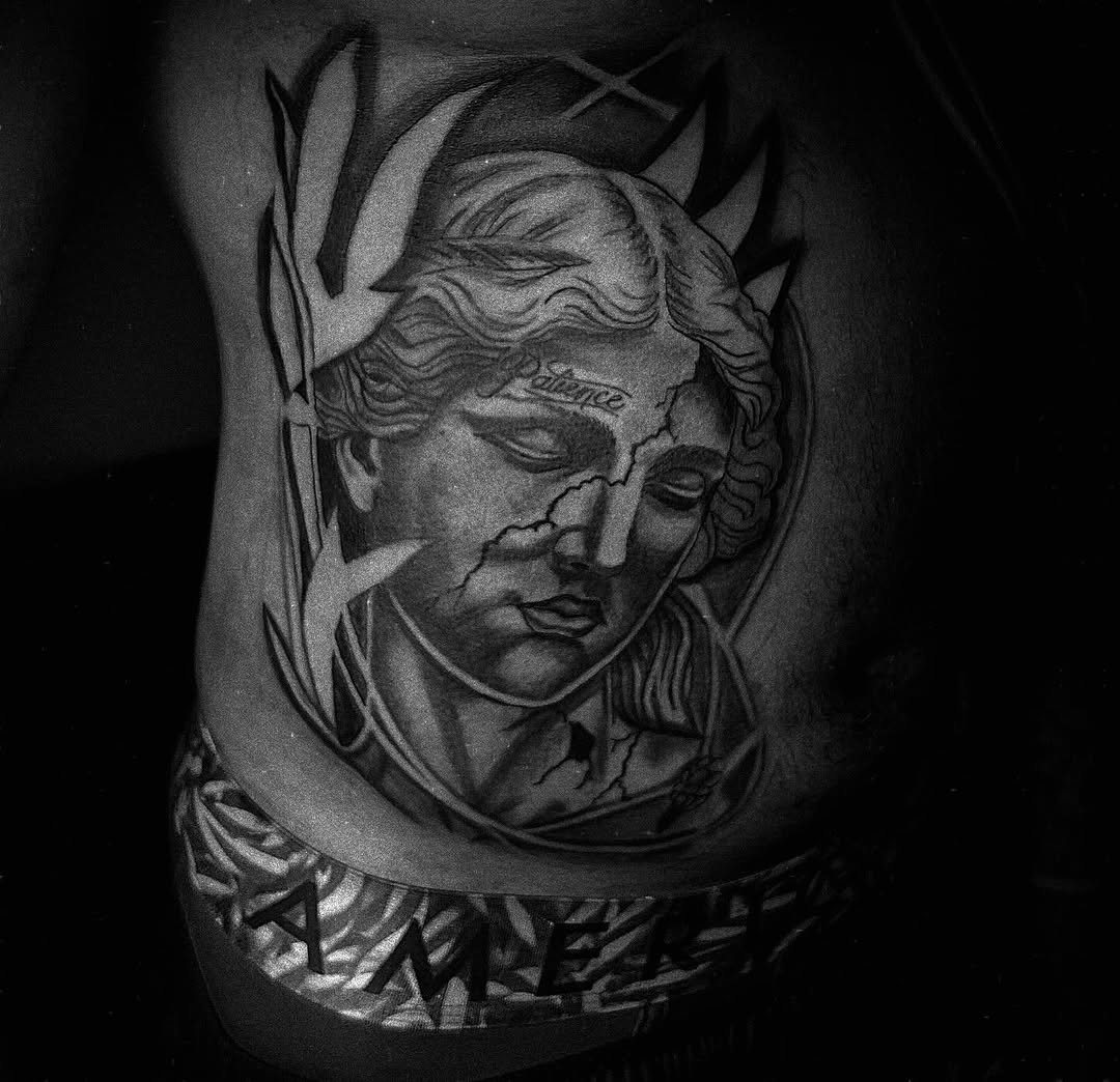 Tattoo by @tattsbyleek โ black_and_grey, realism