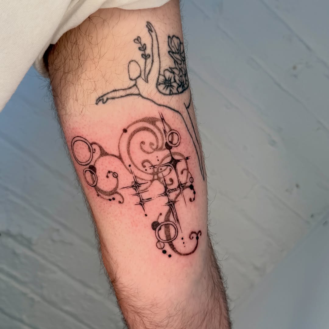 Tattoo by @fairygodfather.ink — geometric, dotwork