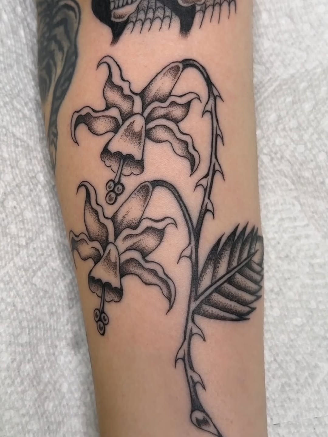 Tattoo by @rinoski.tattoo — black_and_grey, illustrative