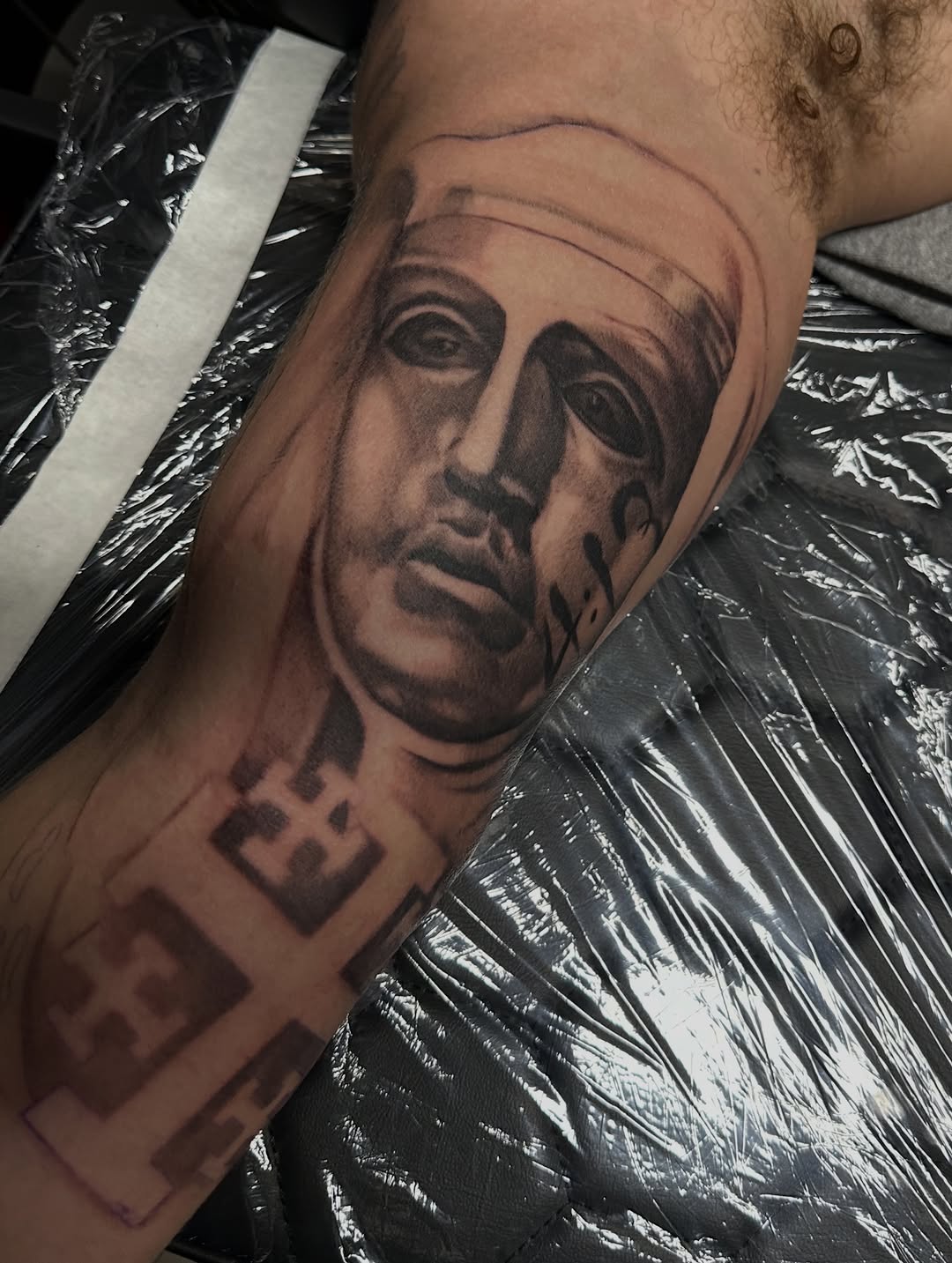 Tattoo by @tattooz_by_trent — realism, black_and_grey