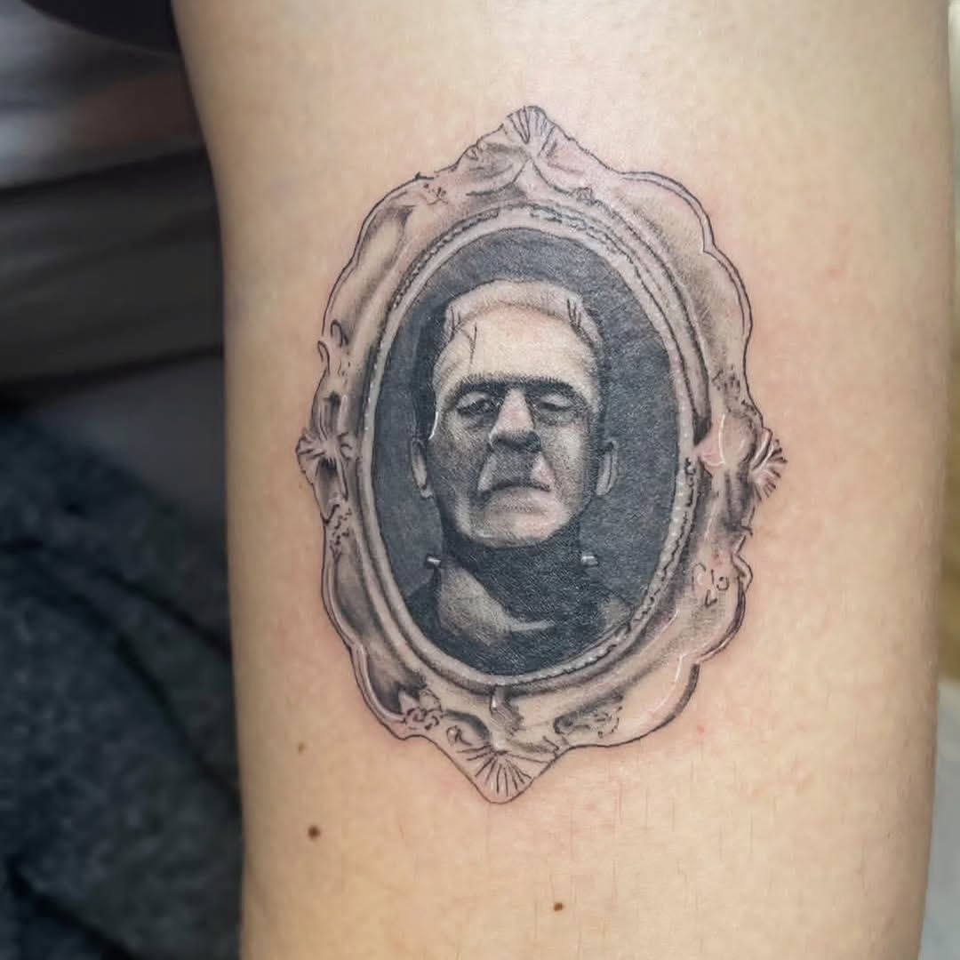 Tattoo by @m3ga.p1xlz — realism, black_and_grey