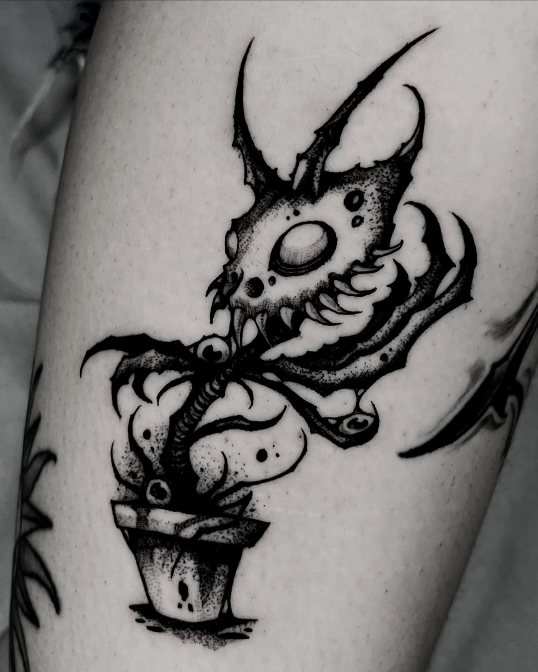 Tattoo by @bryanblack.ttt — black_and_grey, dotwork