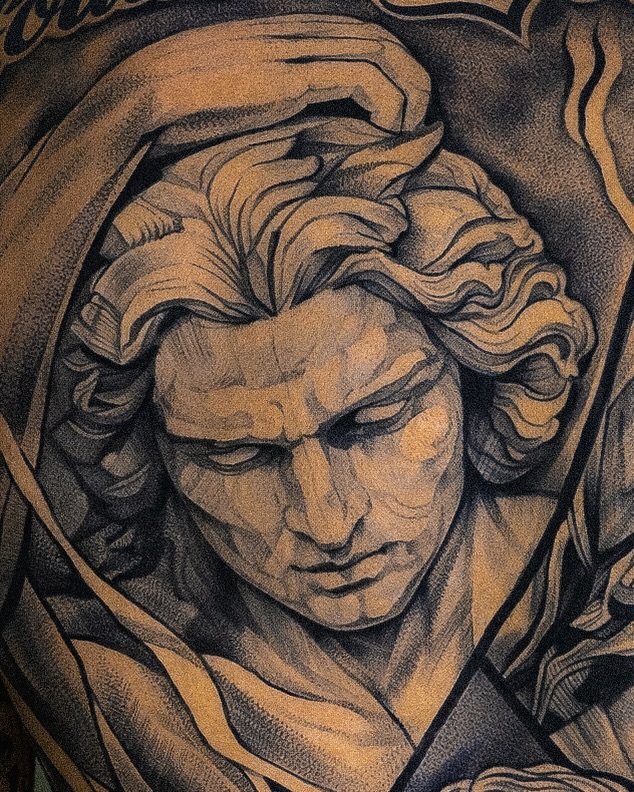 Tattoo by @vegas_tattoo_maksbrand โ realism, black_and_grey