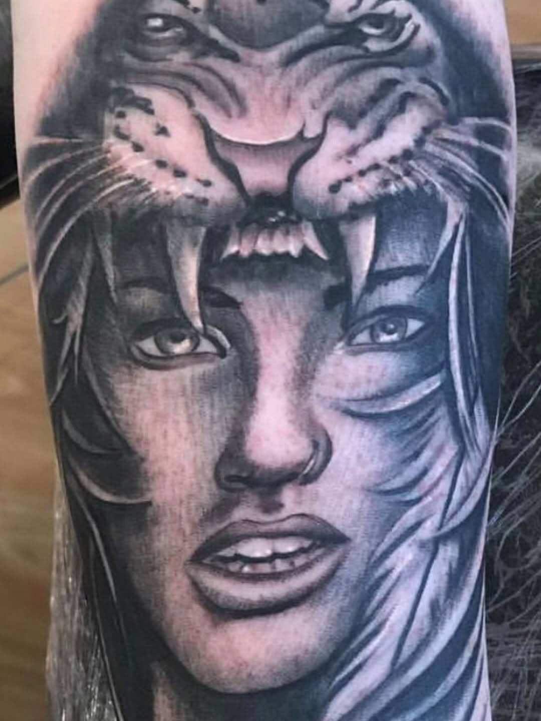 Tattoo by @bigdaddyjaz โ realism, black_and_grey