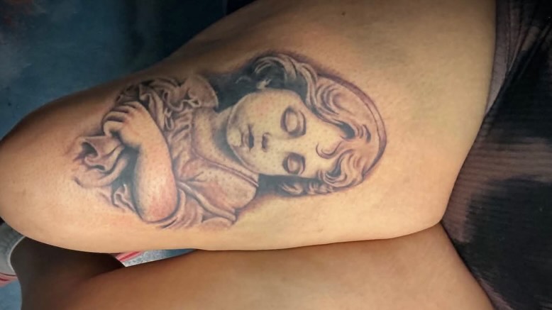 Tattoo by @tusanchotattoos_lv โ realism, black_and_grey