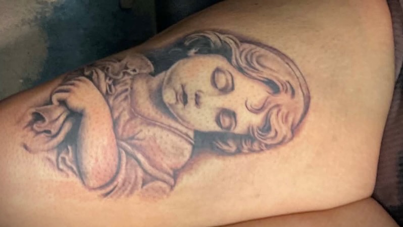 Tattoo by @tusanchotattoos_lv โ realism, black_and_grey