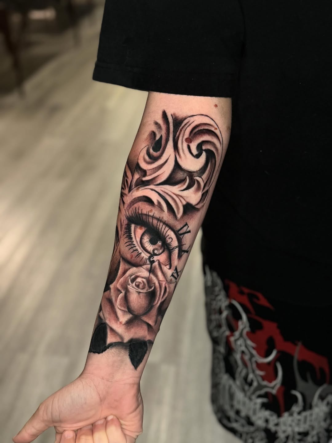 Tattoo by @unrendered_tattz — realism, black_and_grey