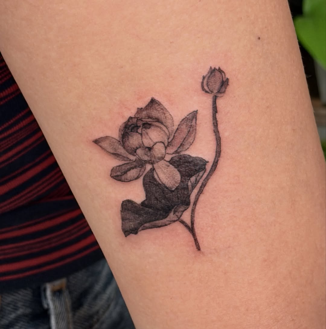 Tattoo by @xinnf_tattoo — realism, black_and_grey