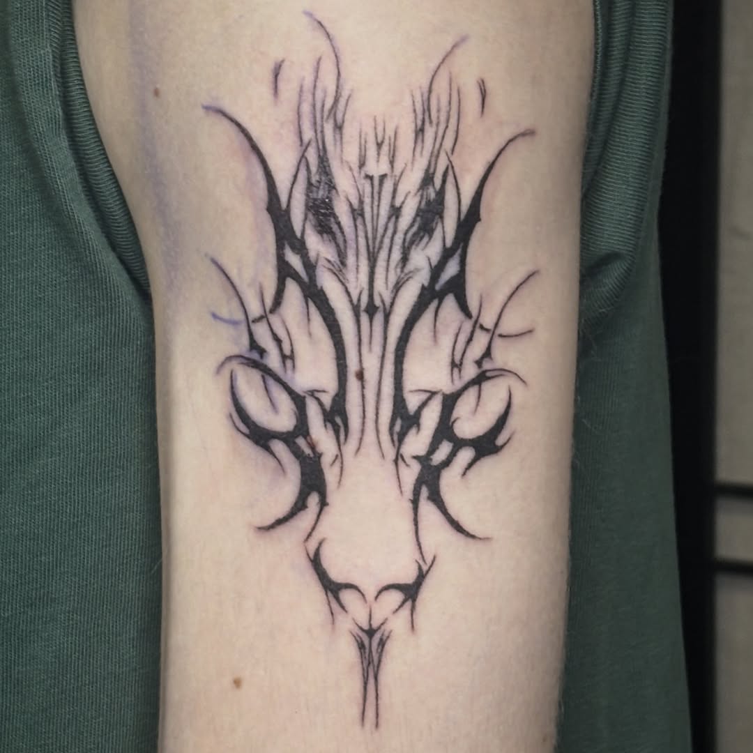 Tattoo by @valentine_tats — blackwork, illustrative