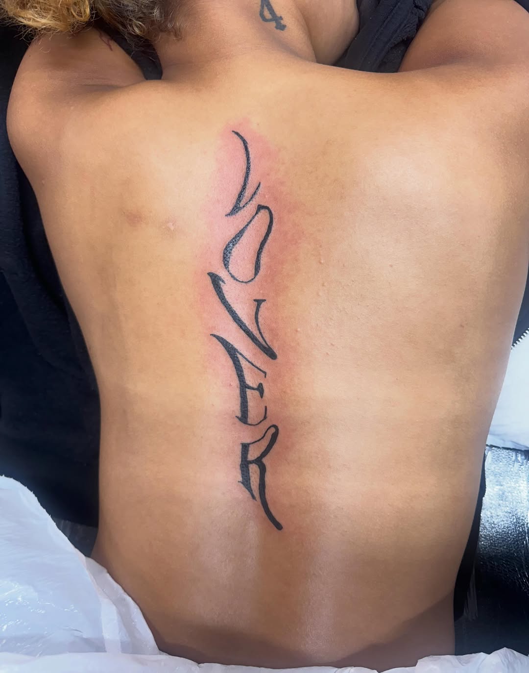 Tattoo by @khali.the.inkboy — lettering_script, illustrative