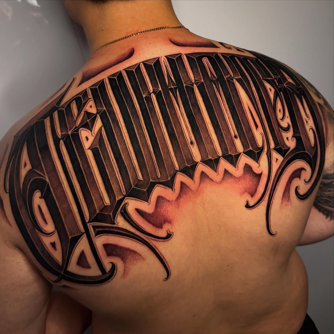 Tattoo by @dopeletterstattoo — lettering_script, black_and_grey