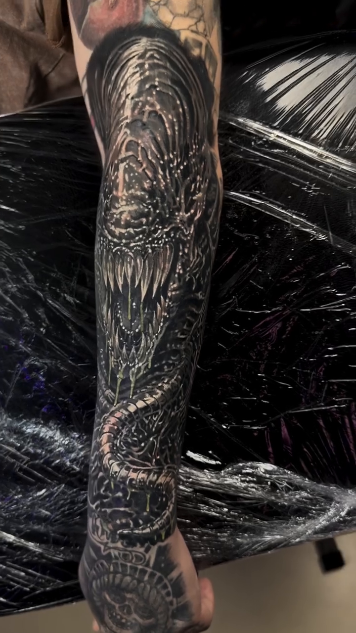 Tattoo by @stevepelkeytattoo — dark_realism, black_and_grey