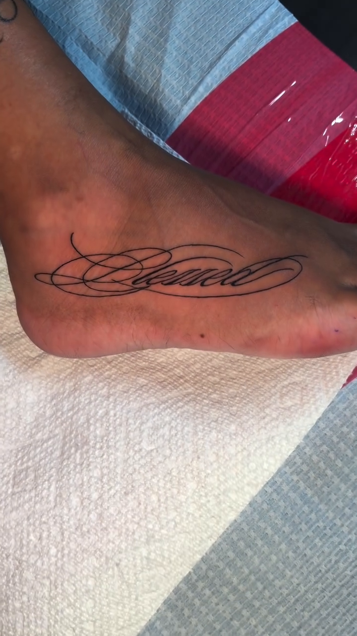 Tattoo by @getmoneetattz โ lettering_script, fine_line