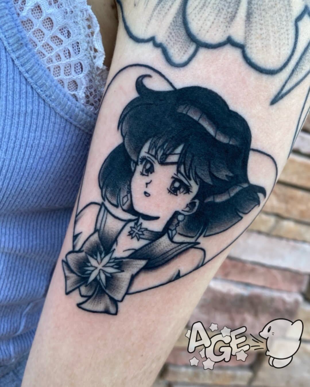 Tattoo by @agedragotattoo — anime, black_and_grey