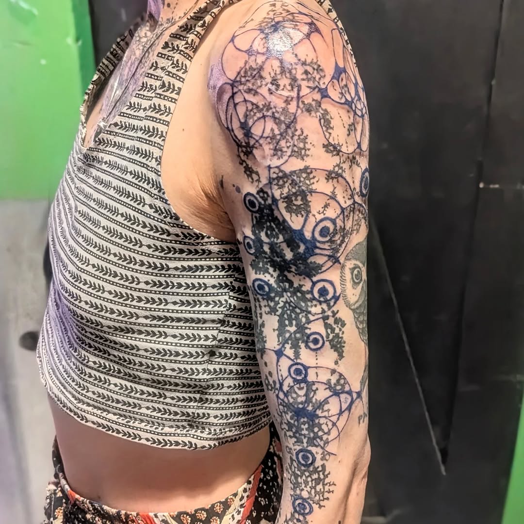Tattoo by @sarah.pi.tattoo — geometric, dotwork