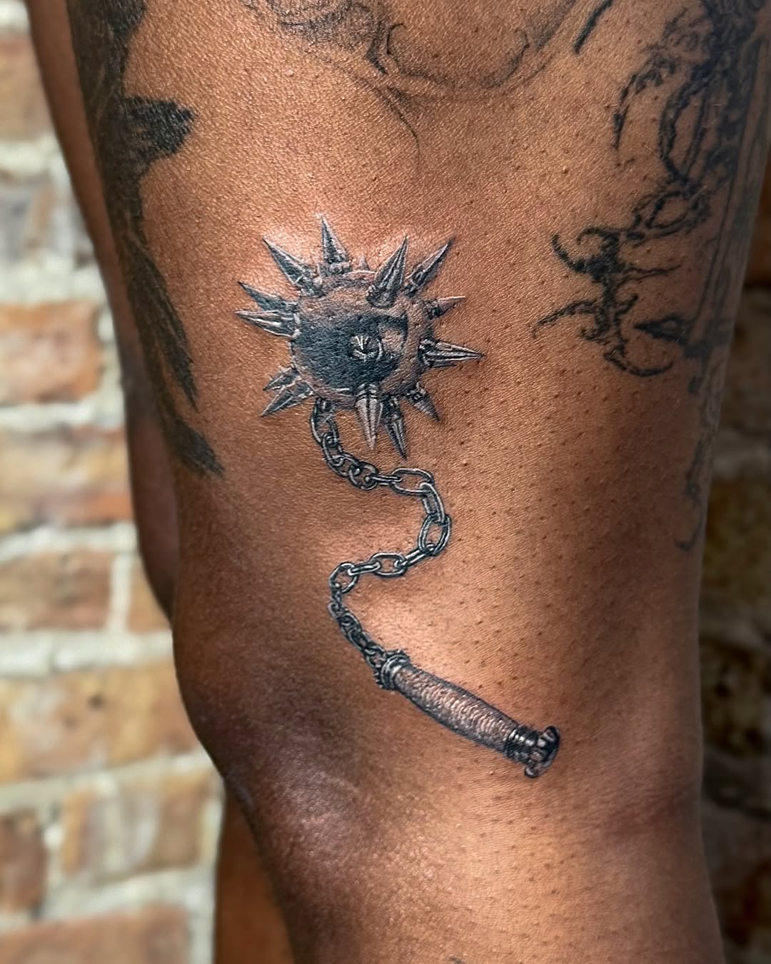 Tattoo by @eblu.ink — realism, black_and_grey