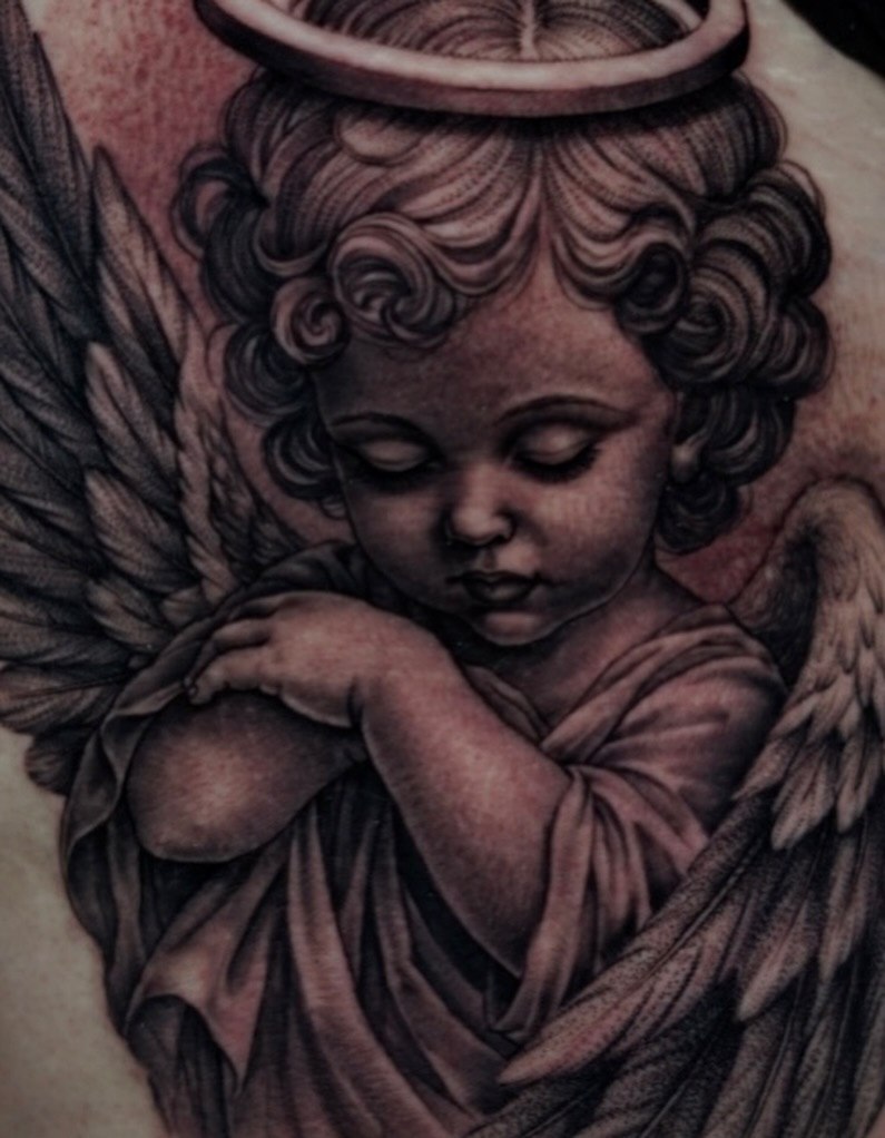 Tattoo by @drew_romero_tattoos โ realism, black_and_grey