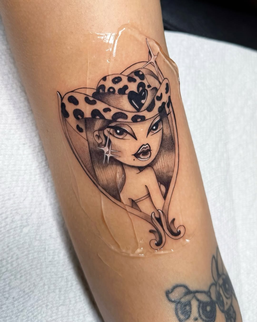 Tattoo by @av1.ink — illustrative, black_and_grey