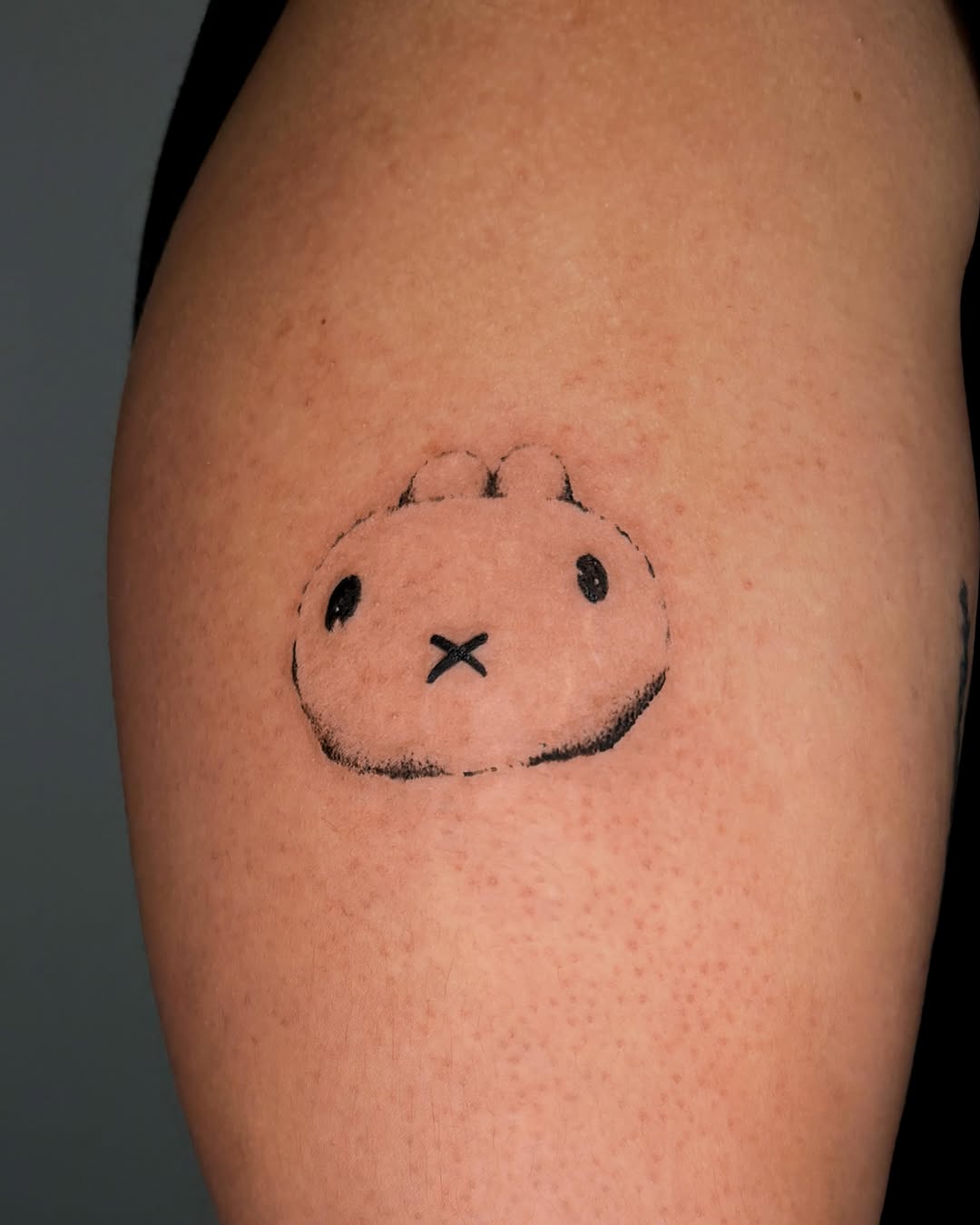 Tattoo by @tofuubrat — illustrative, minimalist