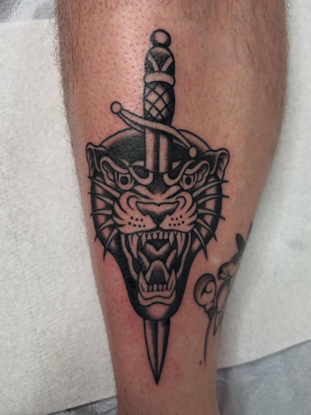 Tattoo by @pembrlily — american_traditional, black_and_grey