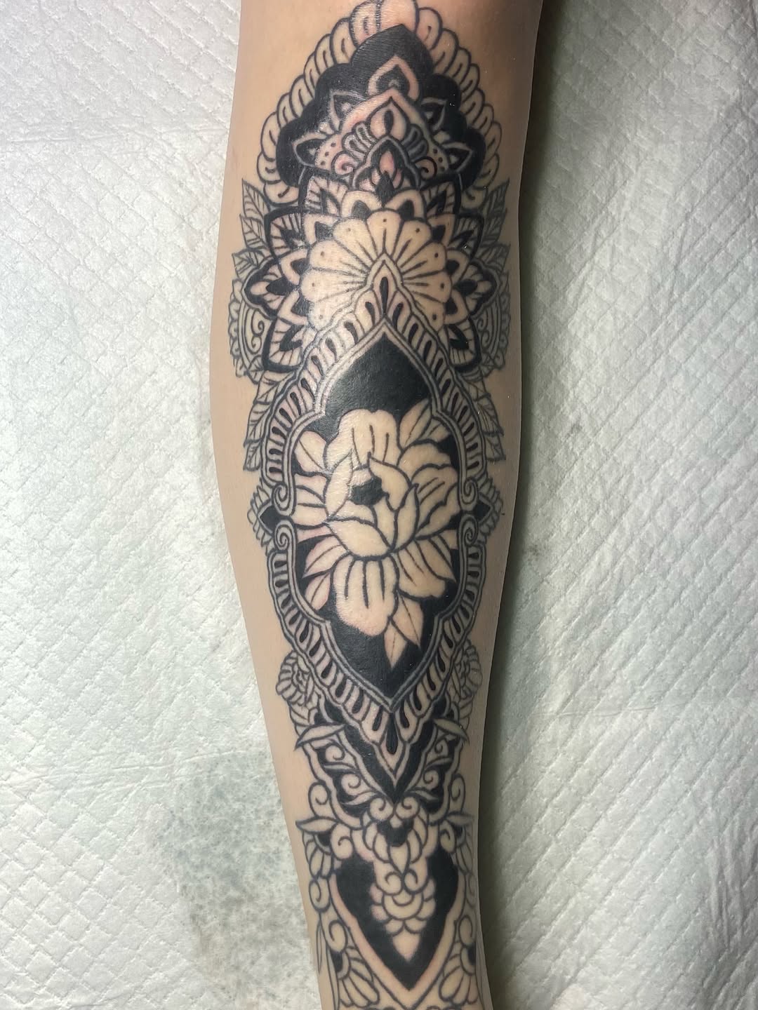 Tattoo by @crabbystabztattoos — blackwork, ornamental