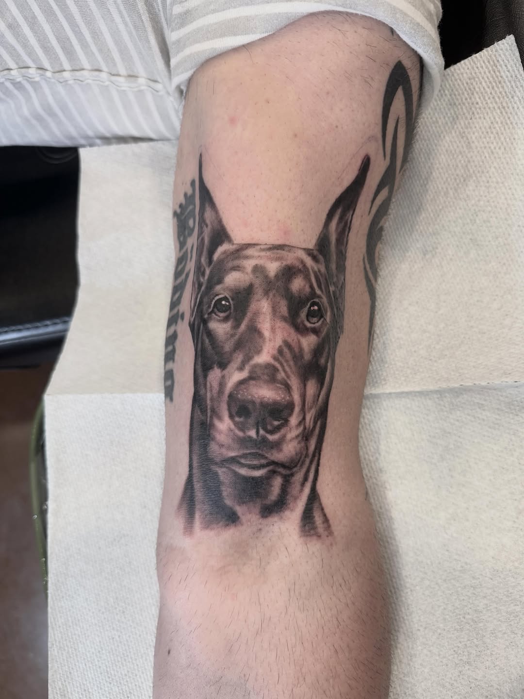 Tattoo by @drewfostertattoo — realism, black_and_grey